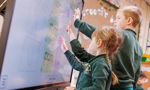 Ysgol Gymraeg Trefynwy pupils working in a classroom